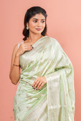 Pastel green raw silk woven saree