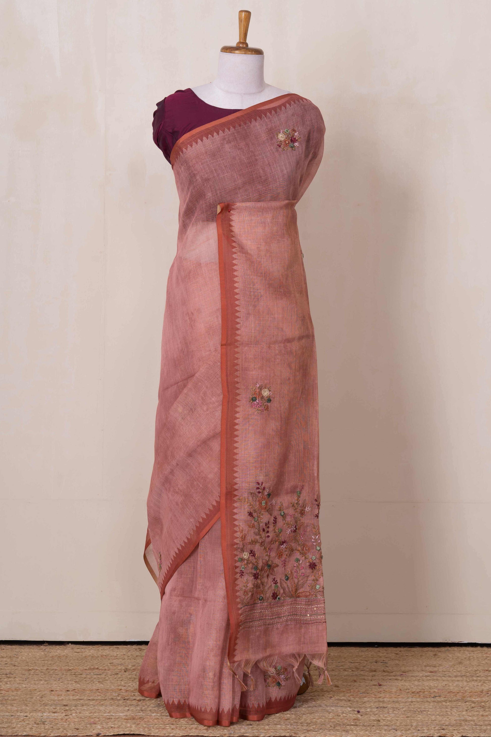 Peach embroidered linen sarees