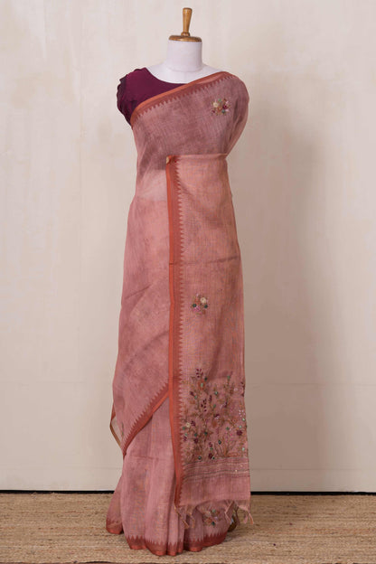 Peach embroidered linen sarees