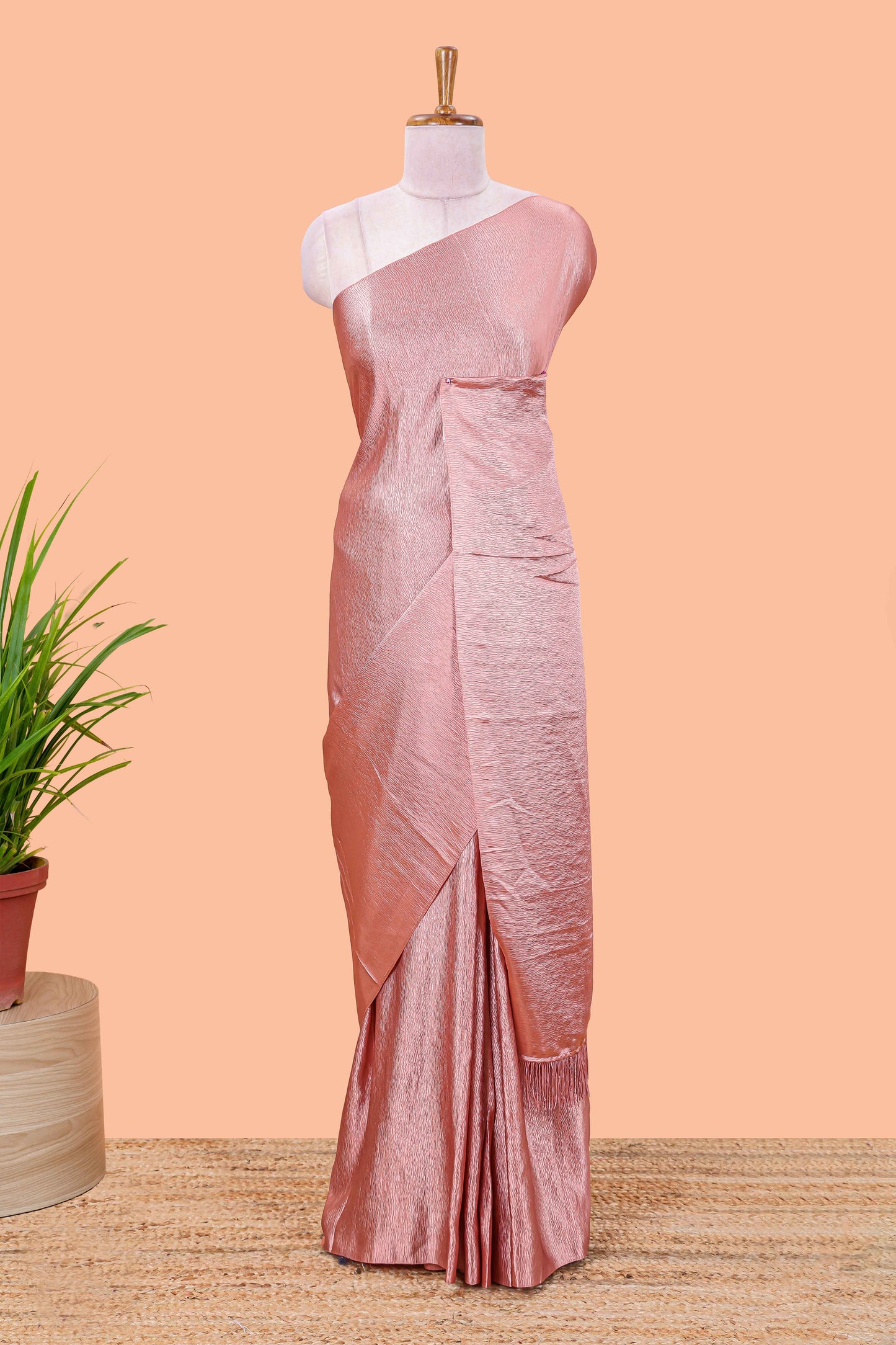 Peach satin crepe borderless saree