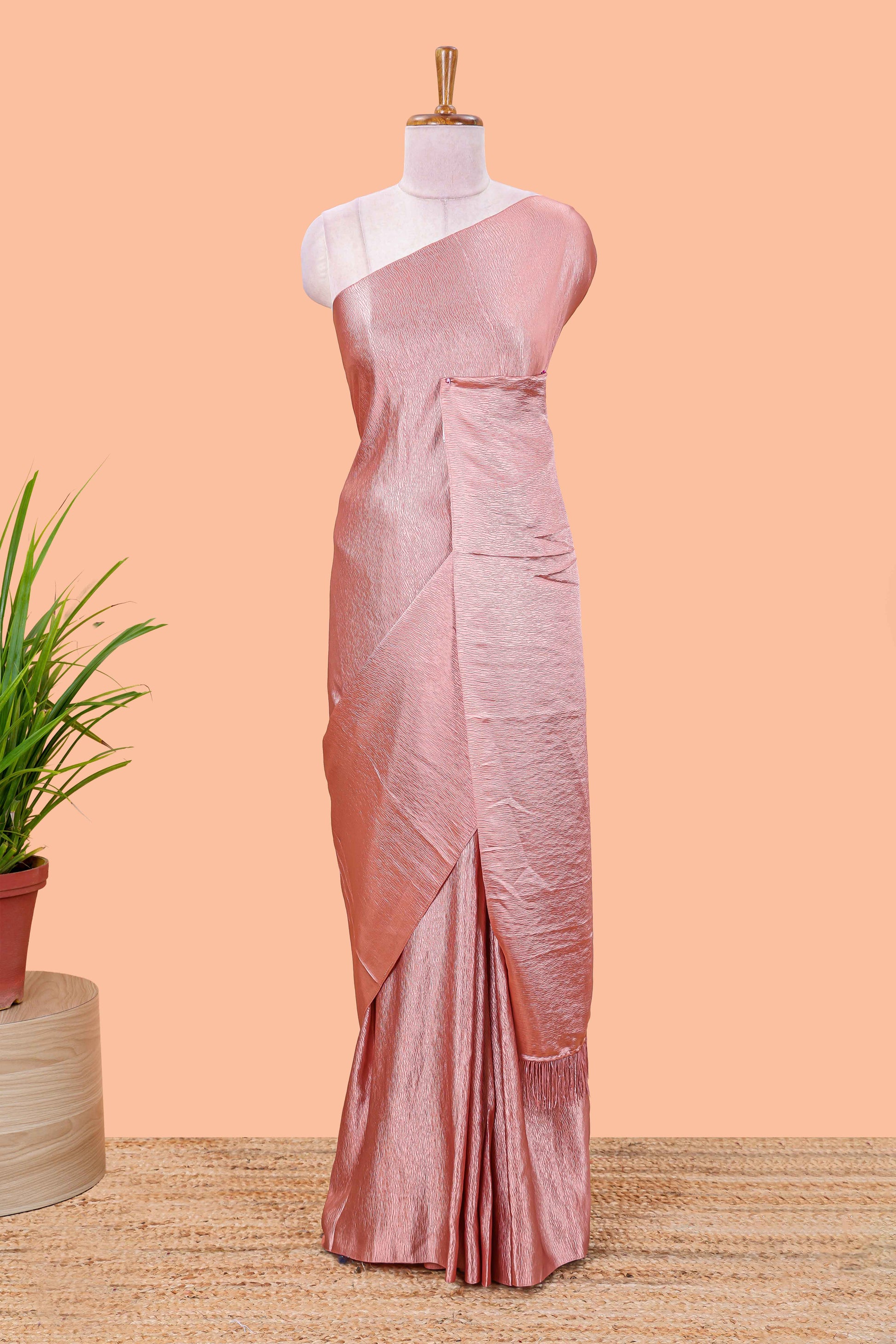 Peach satin crepe borderless saree