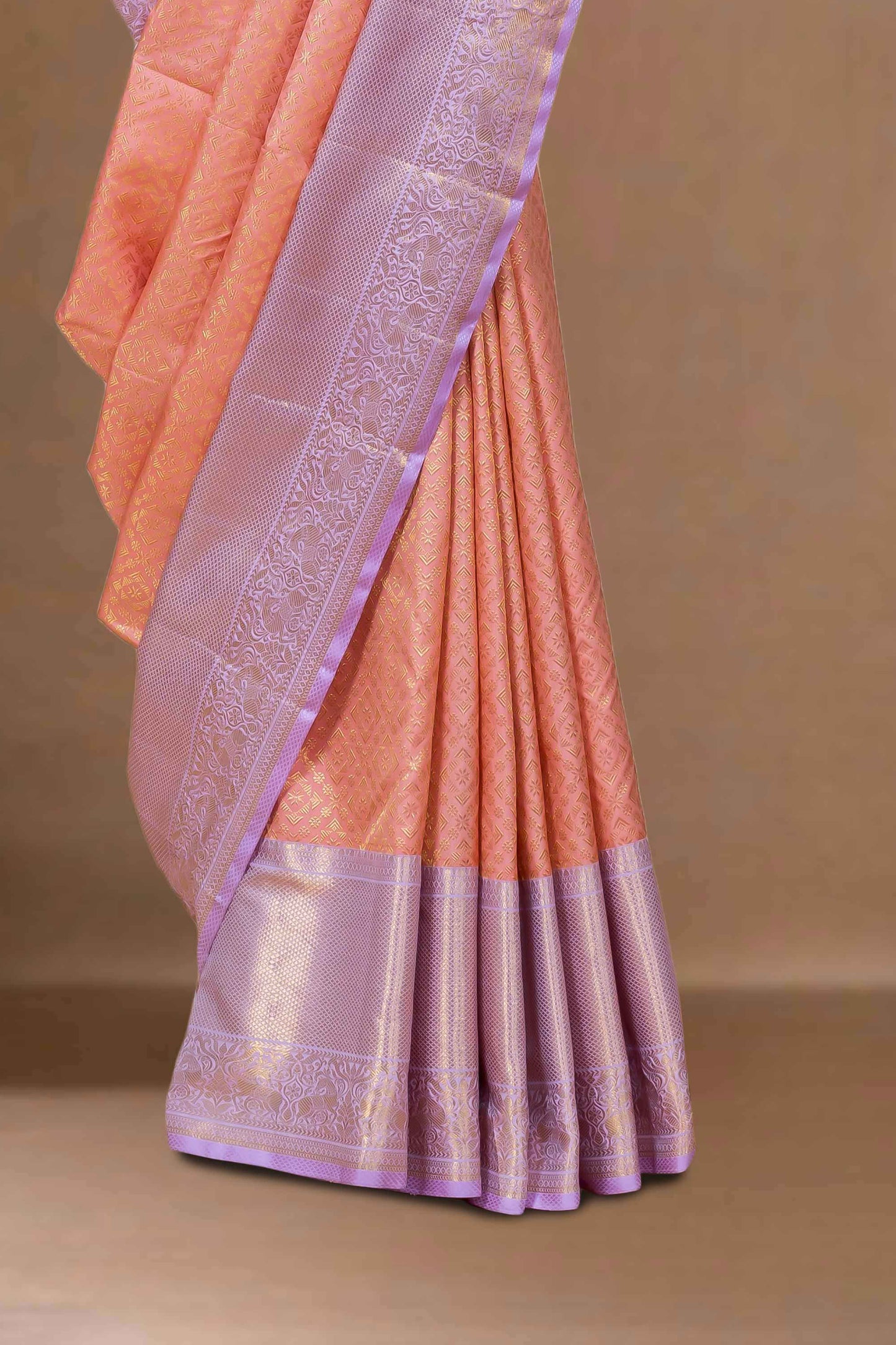 Peach silk saree with zari border