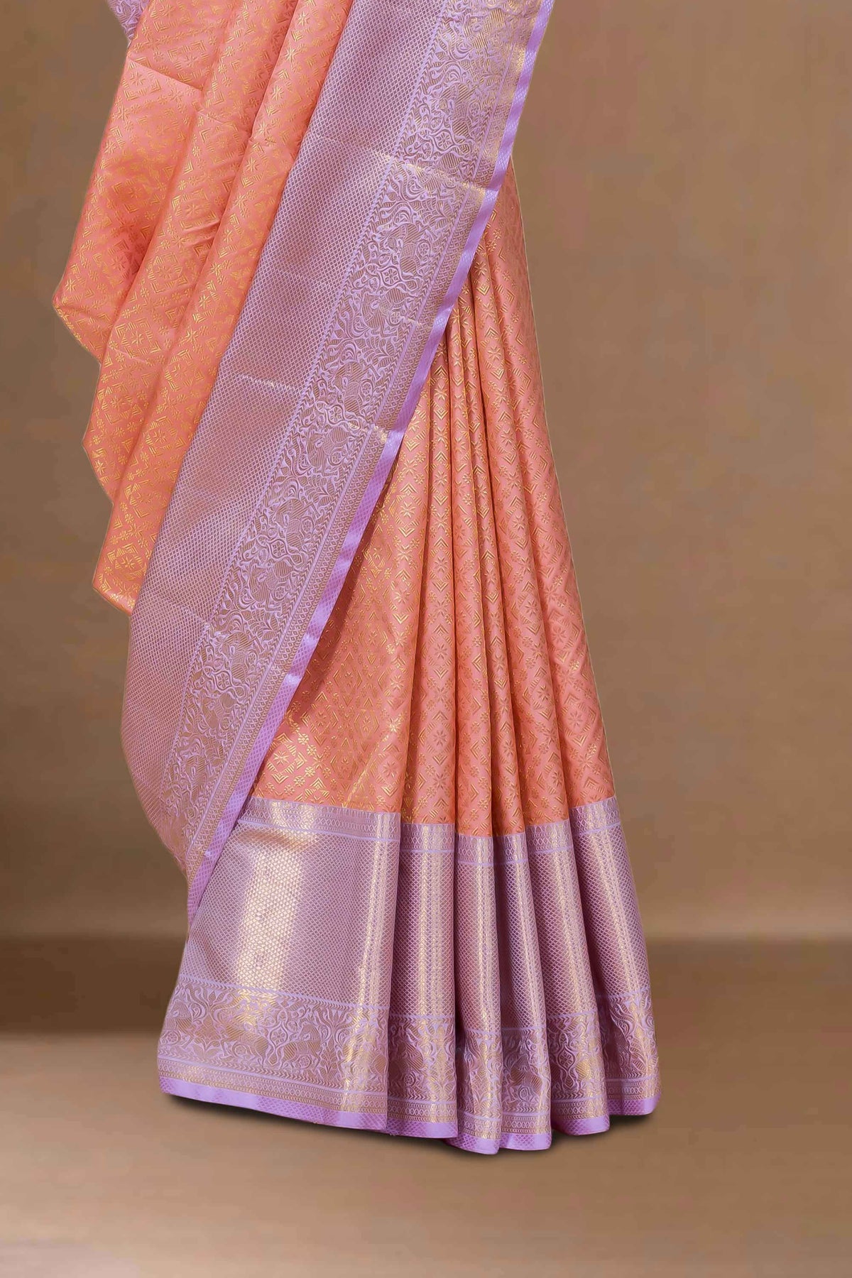 Peach silk saree with zari border