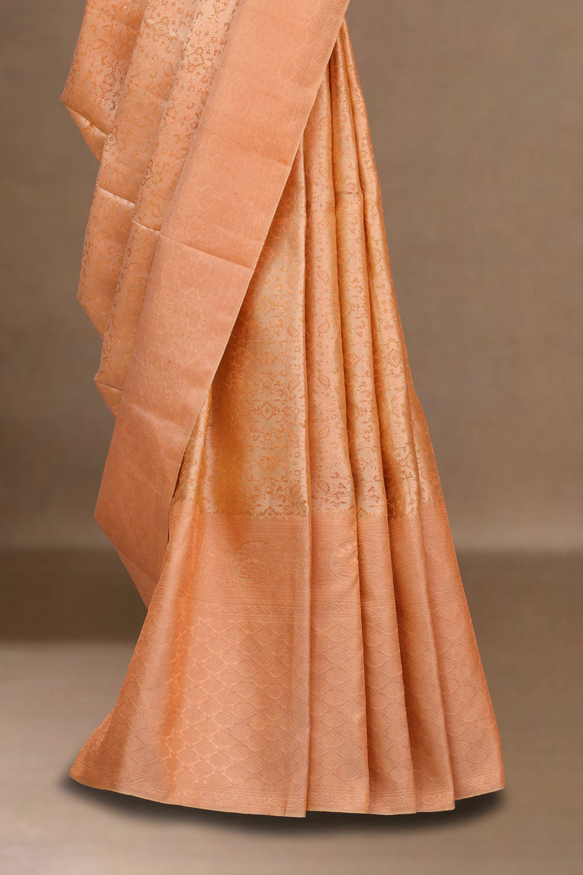 Peach silk sarees with zari border
