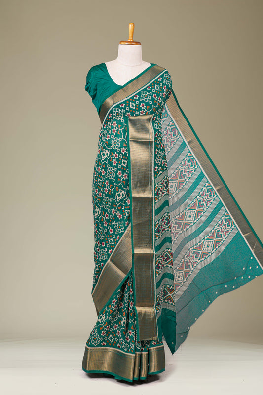 Peacock green ikkat silk saree