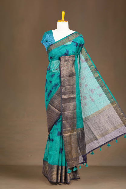 Peacock green linen tie-dye saree