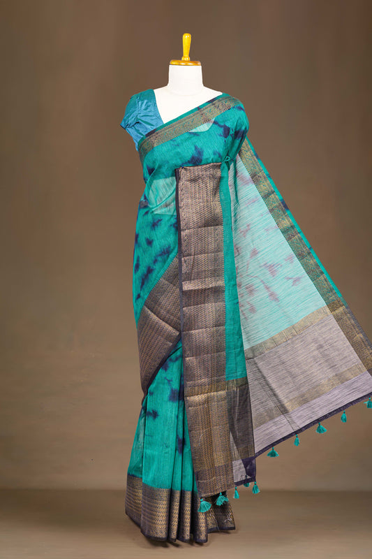 Peacock green linen tie-dye saree