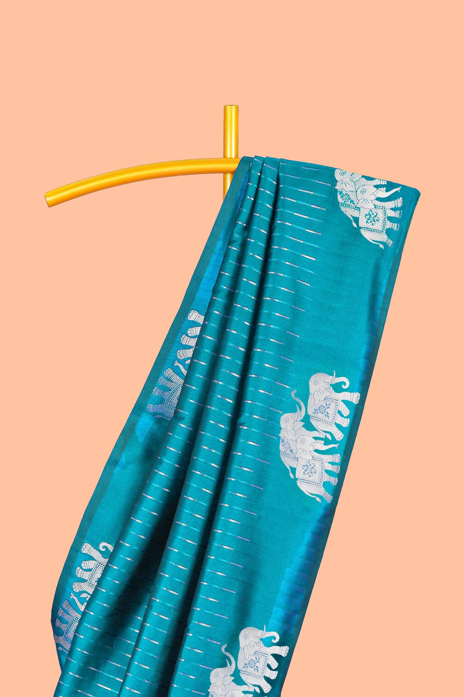Peacock green semi soft silk floral pallu saree