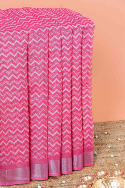 Pink linen saree with zari border