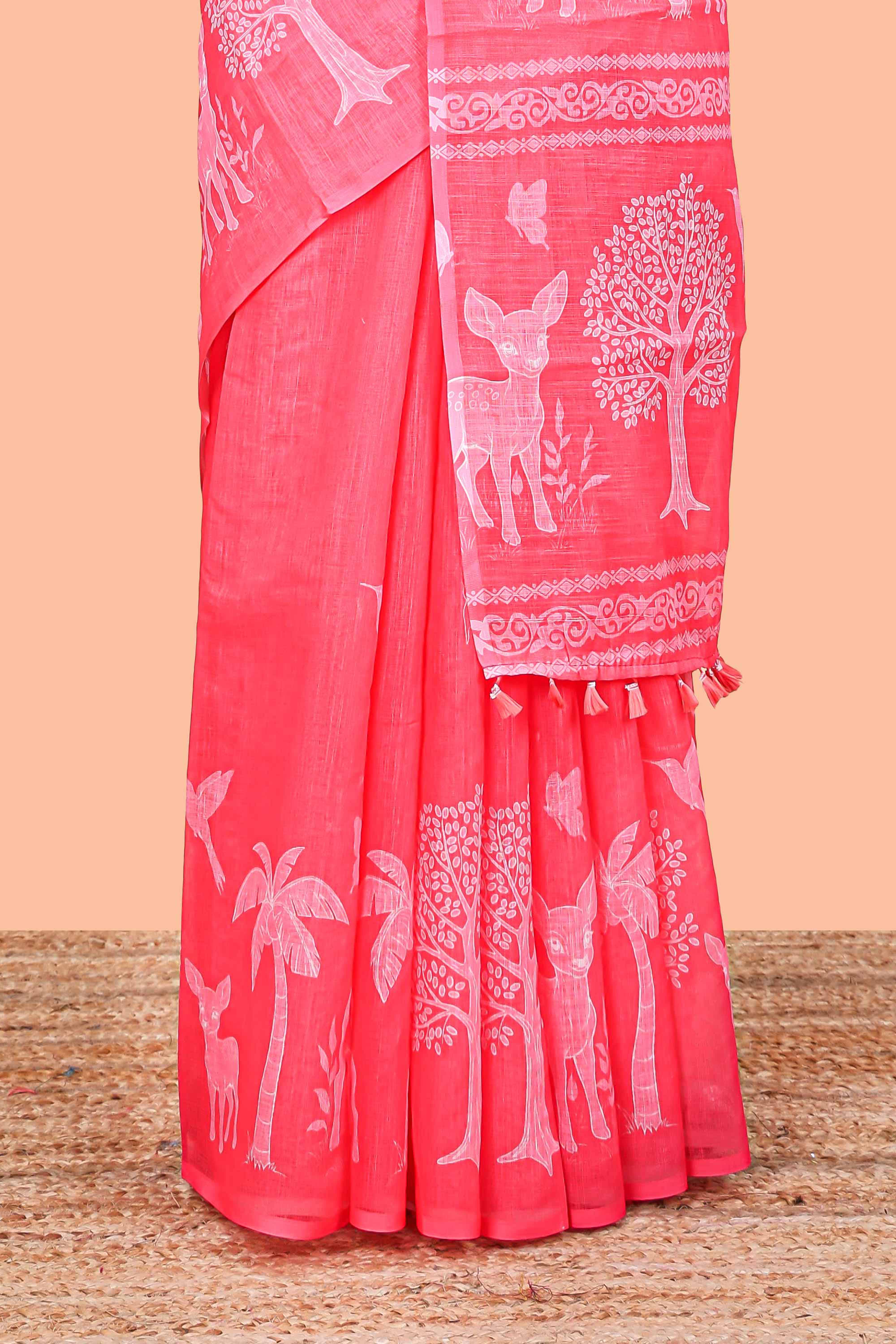Red linen cotton saree with animal print pallu