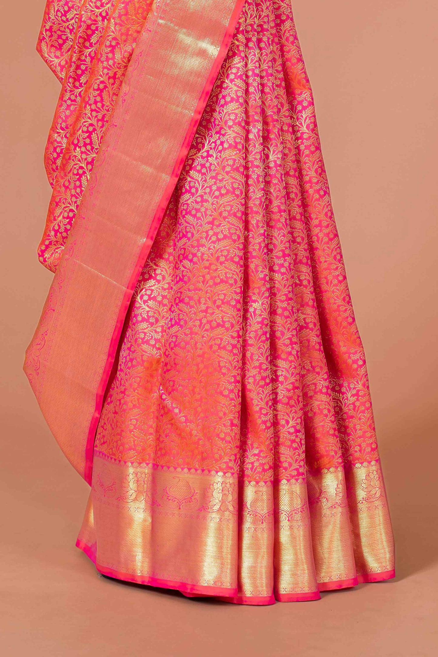 Red silk saree with gold zari border
