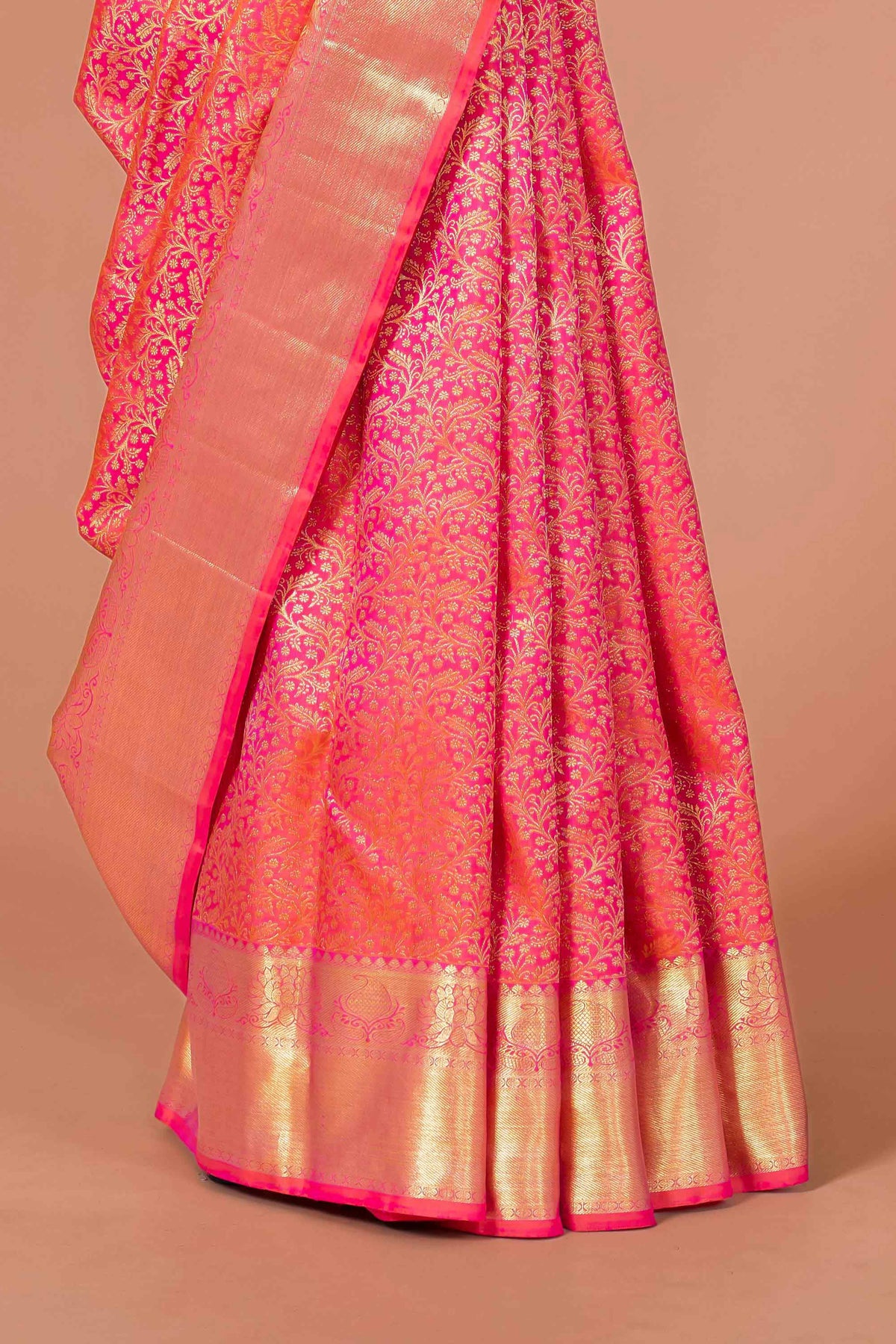 Red silk saree with gold zari border
