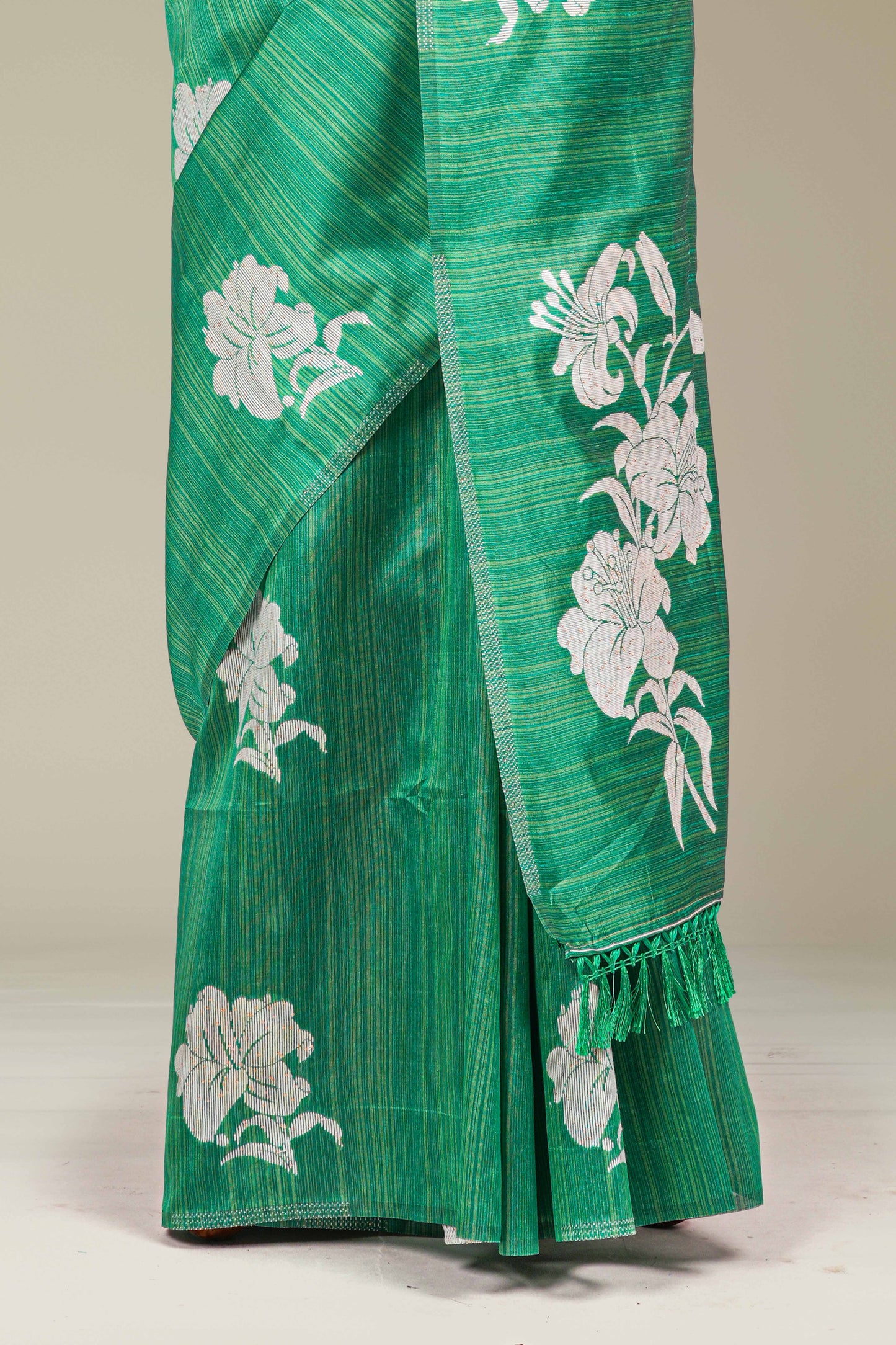 Rich woven texture green saree