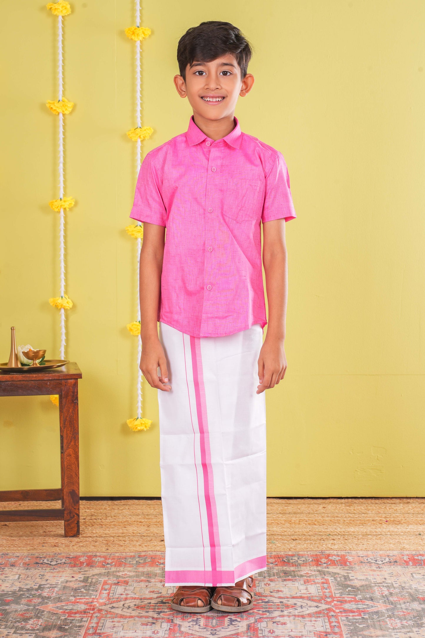 Rose themed boys celebration attire

