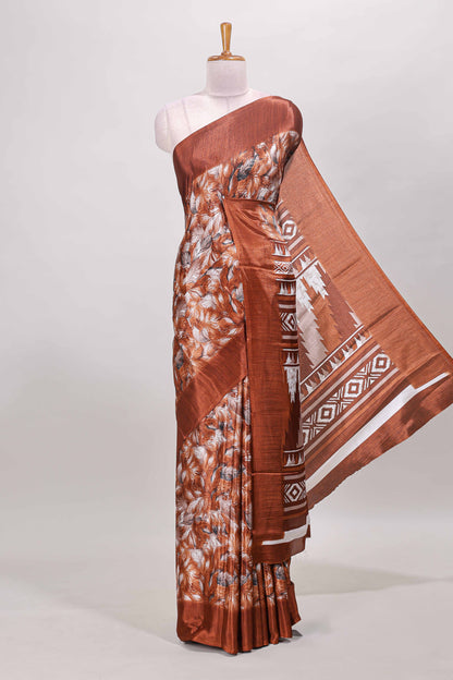 Rust red all over leaf print crepe turkey saree with self border and ikkat style pallu