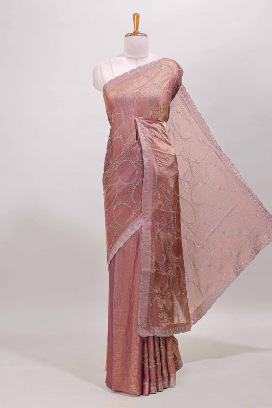 Peach stone work geometric design semi chiffon saree with self scallop border and matching blouse