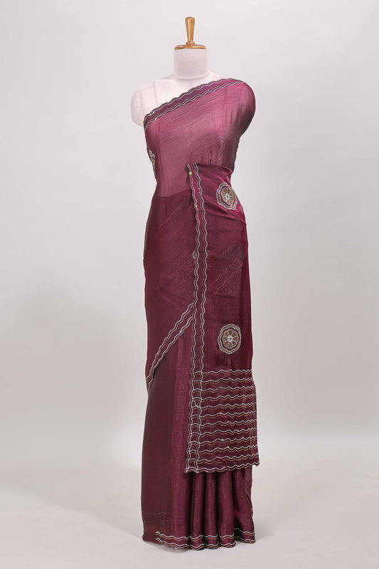 Magenta floral stone work motifs semi chiffon saree with self scallop border and matching blouse
