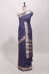 Navy blue checked semi banaras chiffon saree with self zari border and contrast blouse