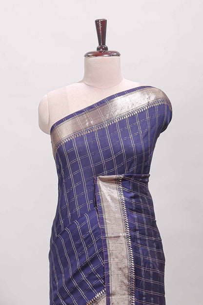 Navy blue checked semi banaras chiffon saree with self zari border and contrast blouse