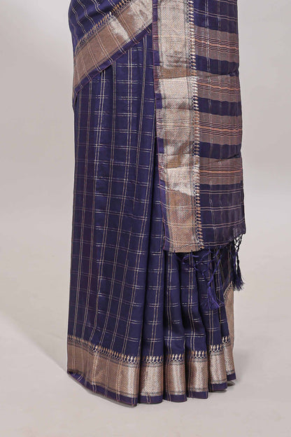 Navy blue checked semi banaras chiffon saree with self zari border and contrast blouse