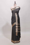 Black checked semi banaras chiffon saree with self zari border and contrast blouse