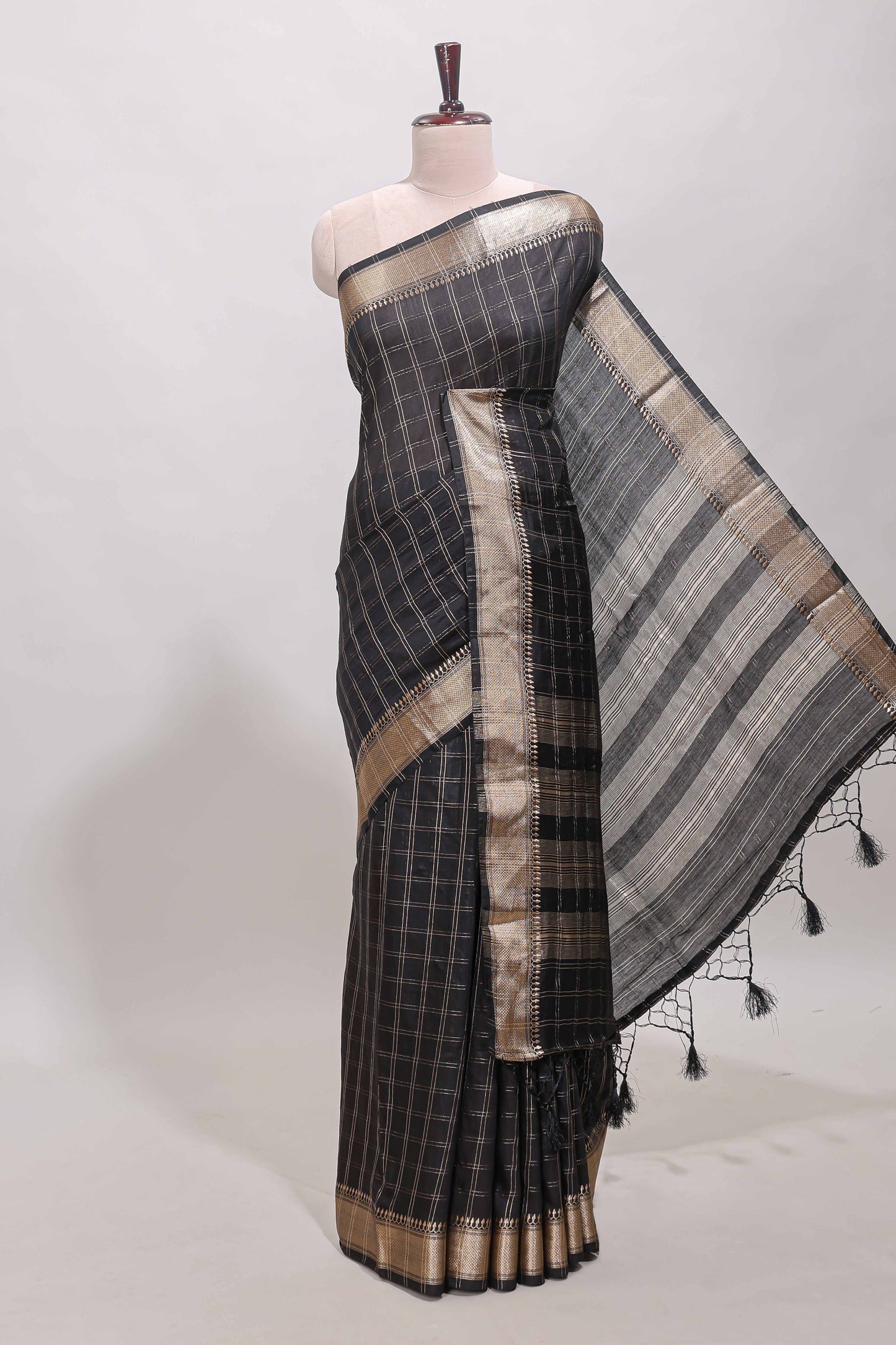 Black checked semi banaras chiffon saree with self zari border and contrast blouse