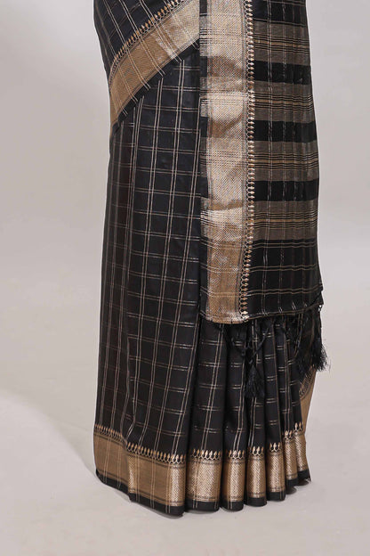 Black checked semi banaras chiffon saree with self zari border and contrast blouse
