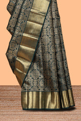 Green unique zari design swayamvara pattu saree with self zari border and matching blouse