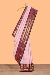 Baby pink checked zari design swayamvara pattu saree with contrast zari border and blouse
