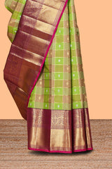 Green checked zari motifs design swayamvara pattu saree with contrast zari border and blouse