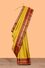 Mustard yellow bird motifs zari design swayamvara pattu saree with contrast border and blouse