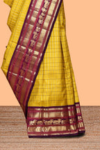 Yellow checked zari design swayamvara pattu saree with contrast zari border and blouse