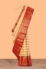Yellow & white dual shade checked motifs zari design swayamvara pattu saree with contrast zari border and blouse