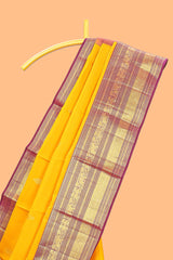 Bright yellow zari butta designs swayamvara pattu saree withcontrast zari border and blouse