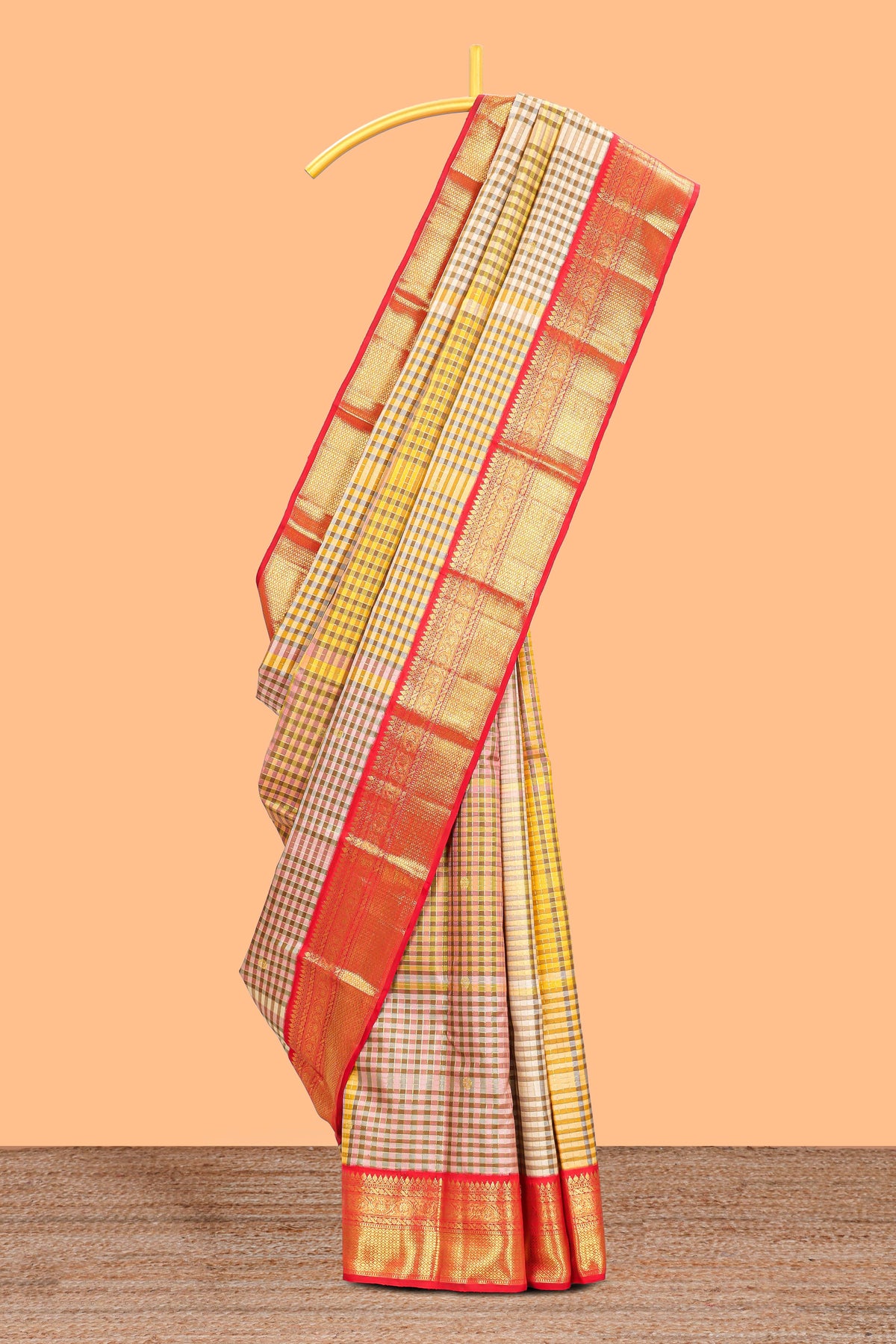 Cream with warm-toned checked swayamvara pattu saree with contrast zari border and pallu along with plain blouse