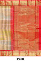 Cream with warm-toned checked swayamvara pattu saree with contrast zari border and pallu along with plain blouse