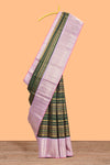 Dark green zari striped swayamvara pattu saree with contrast lavender zari border and pallu comes with plain blouse