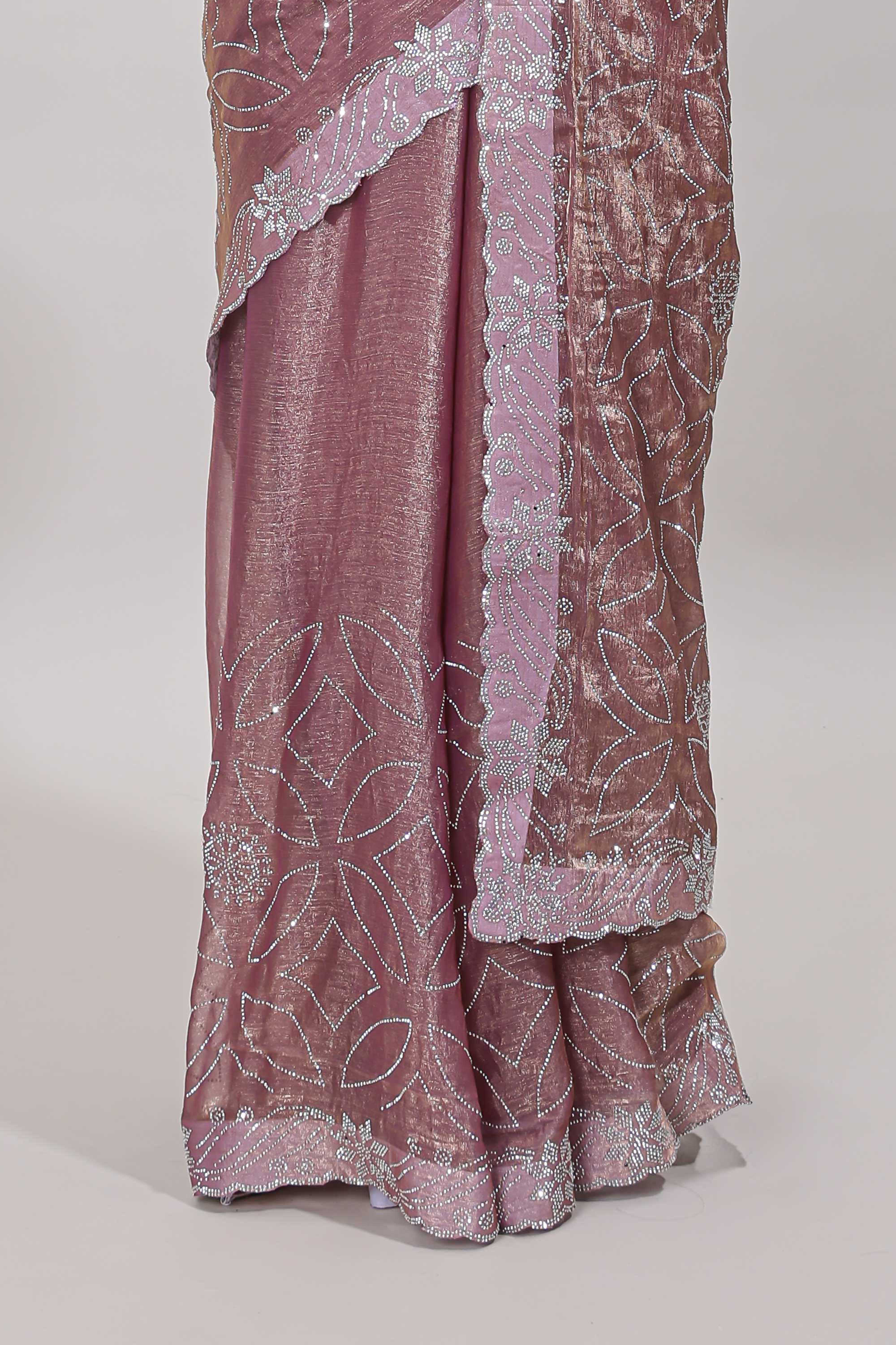Stonework peach color saree