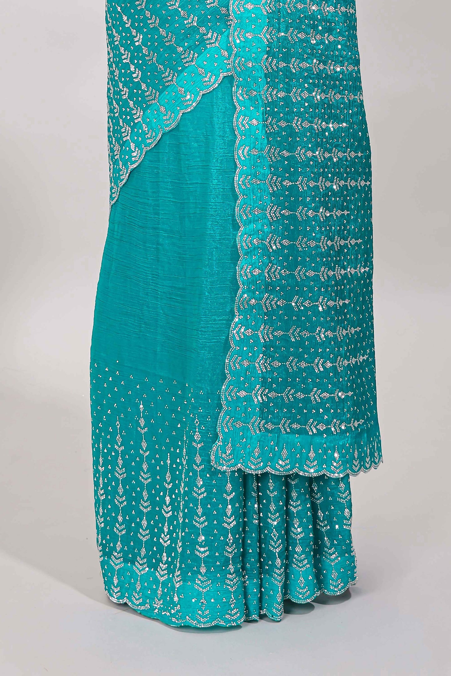 Stonework turquoise saree