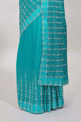 Stonework turquoise saree