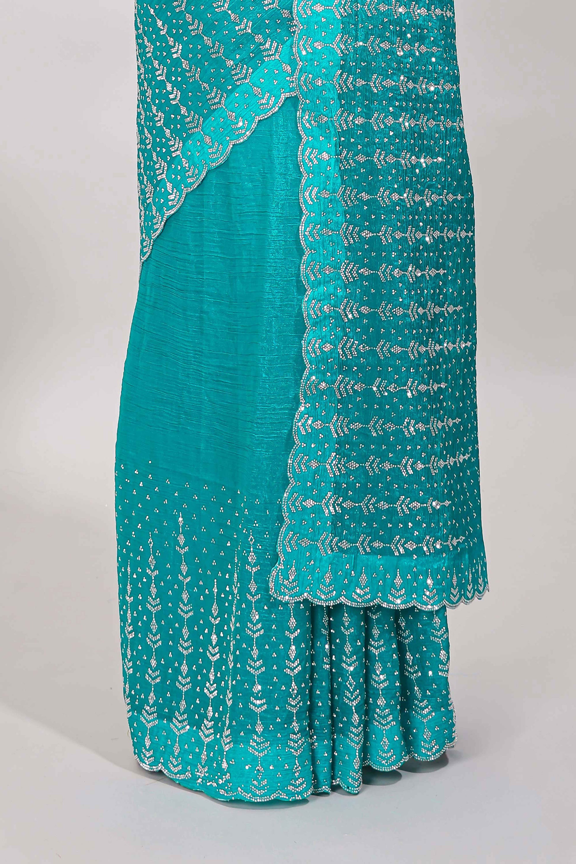 Stonework turquoise saree