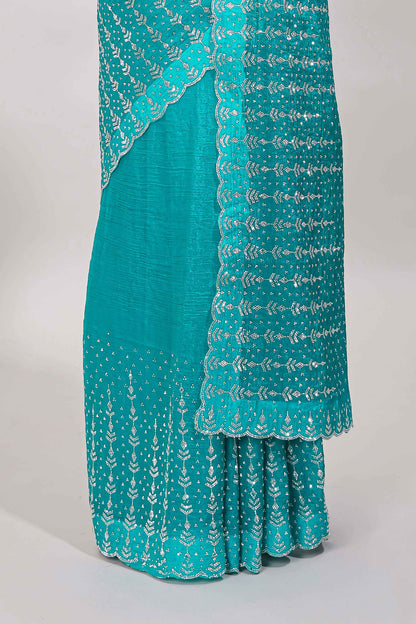 Stonework turquoise saree