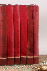 Maroon plain ikkat cotton saree with contrast border and zari striped pallu