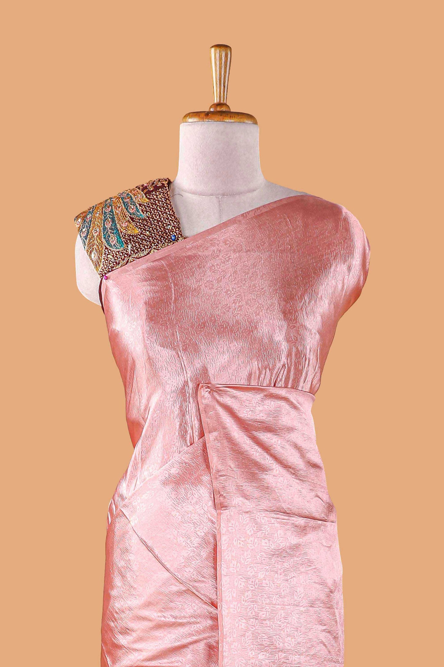 Borderless Pink Jacquard Satin Georgette Crush Saree paired with a contrast blouse featuring exquisite peacock embroidery