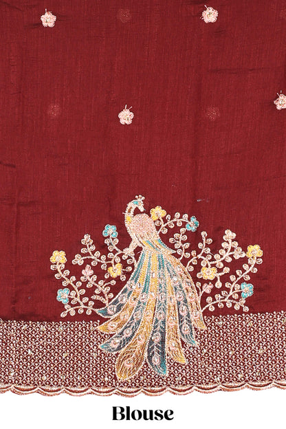 Borderless Pink Jacquard Satin Georgette Crush Saree paired with a contrast blouse featuring exquisite peacock embroidery