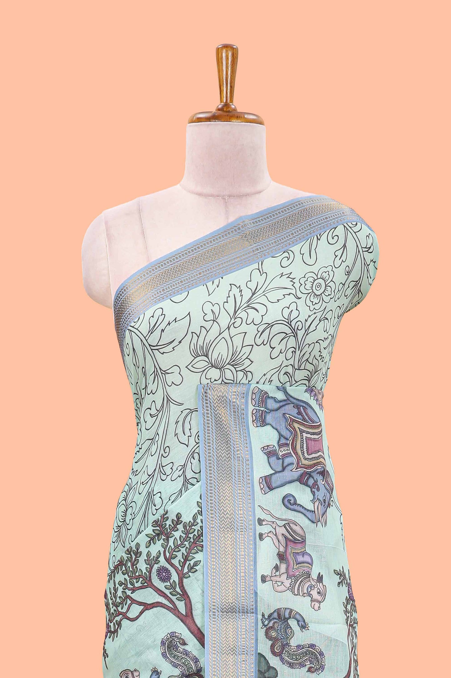 Turquoise green chirala cotton floral and animal theme digital print saree with zari border