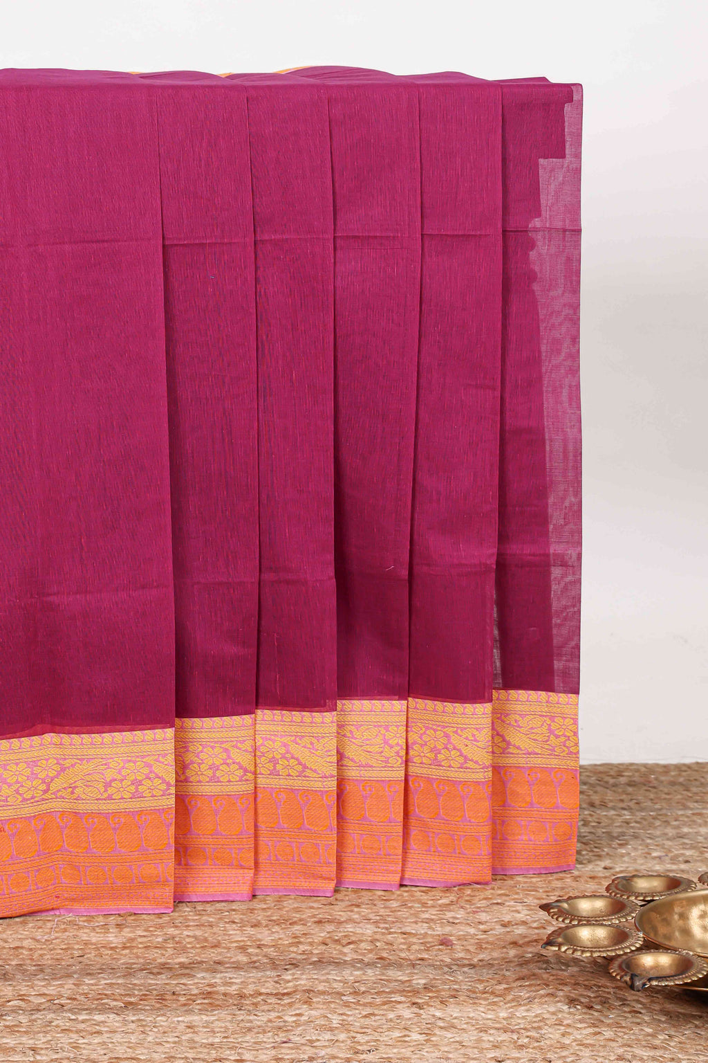 Maroon plain chirala cotton saree with contrast border and striped pallu