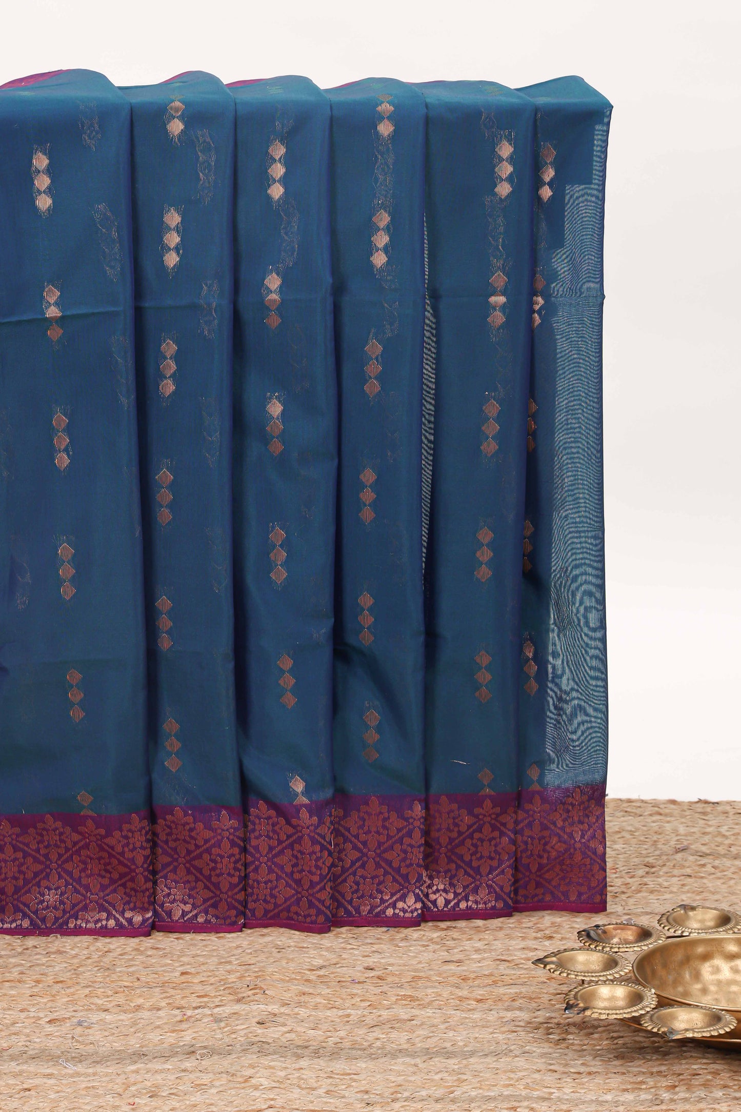 Blue zari motifs semisilk cotton saree with contrast zari border and matching blouse