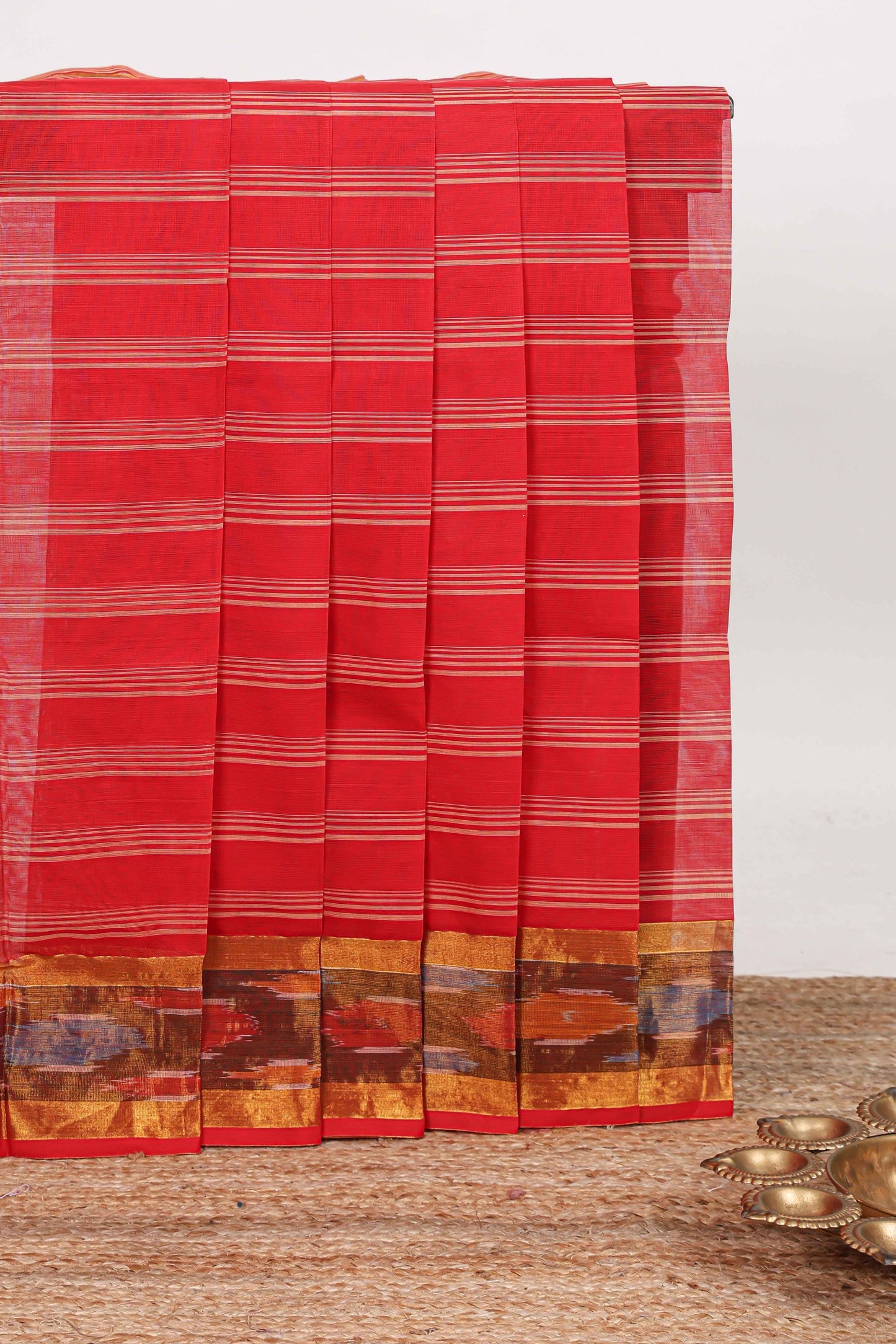Red striped venkatagiri cotton saree with self ikkat style zari border and matching striped pallu