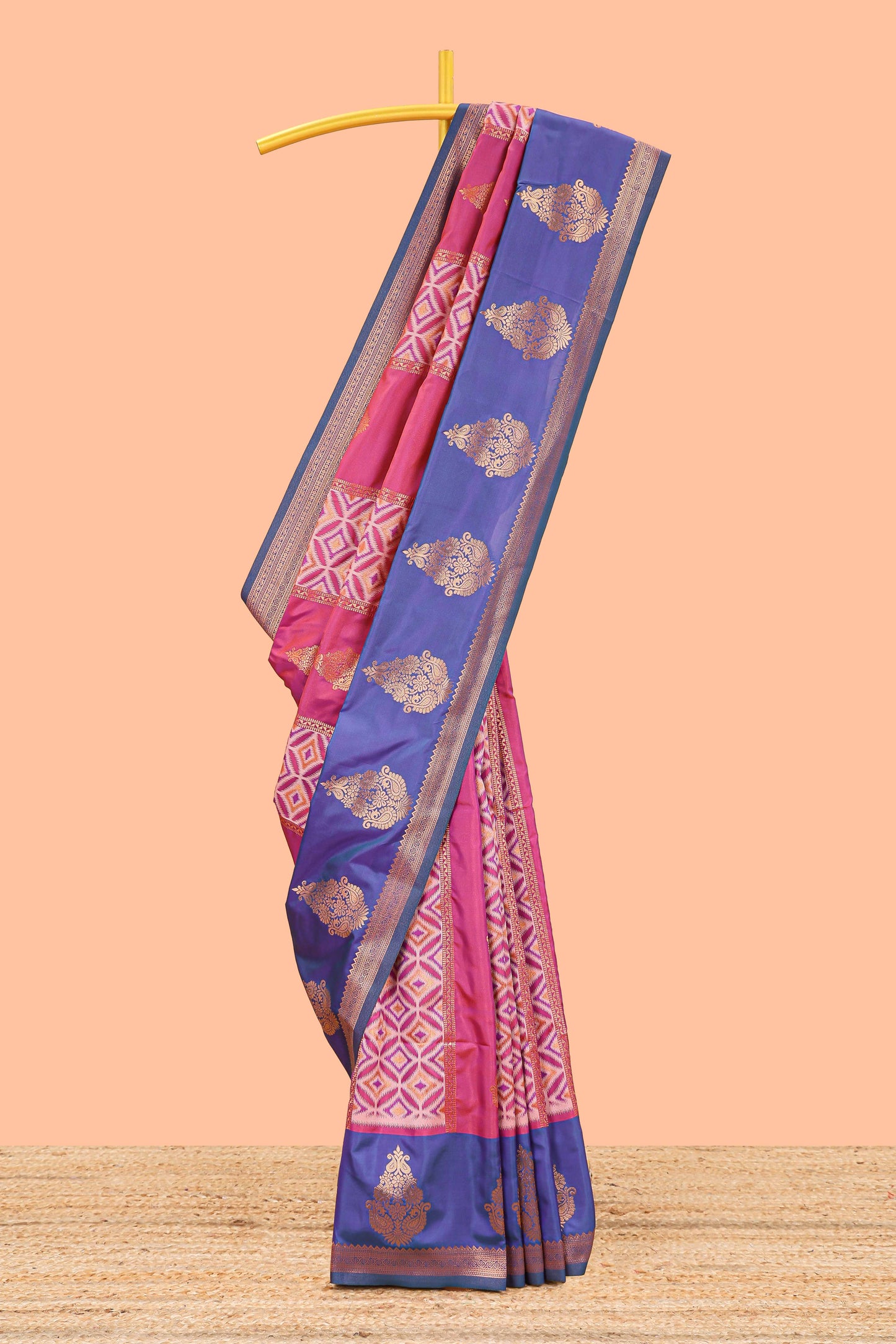 Magenta semi soft silk with striped pochampally ikkat design and contrast zari border